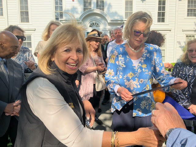 Islip Town Supervisor Angie Carpenter and SVIS president Barbara Fitzpatrick cut the ribbon at the newly refurbished Gillette House.